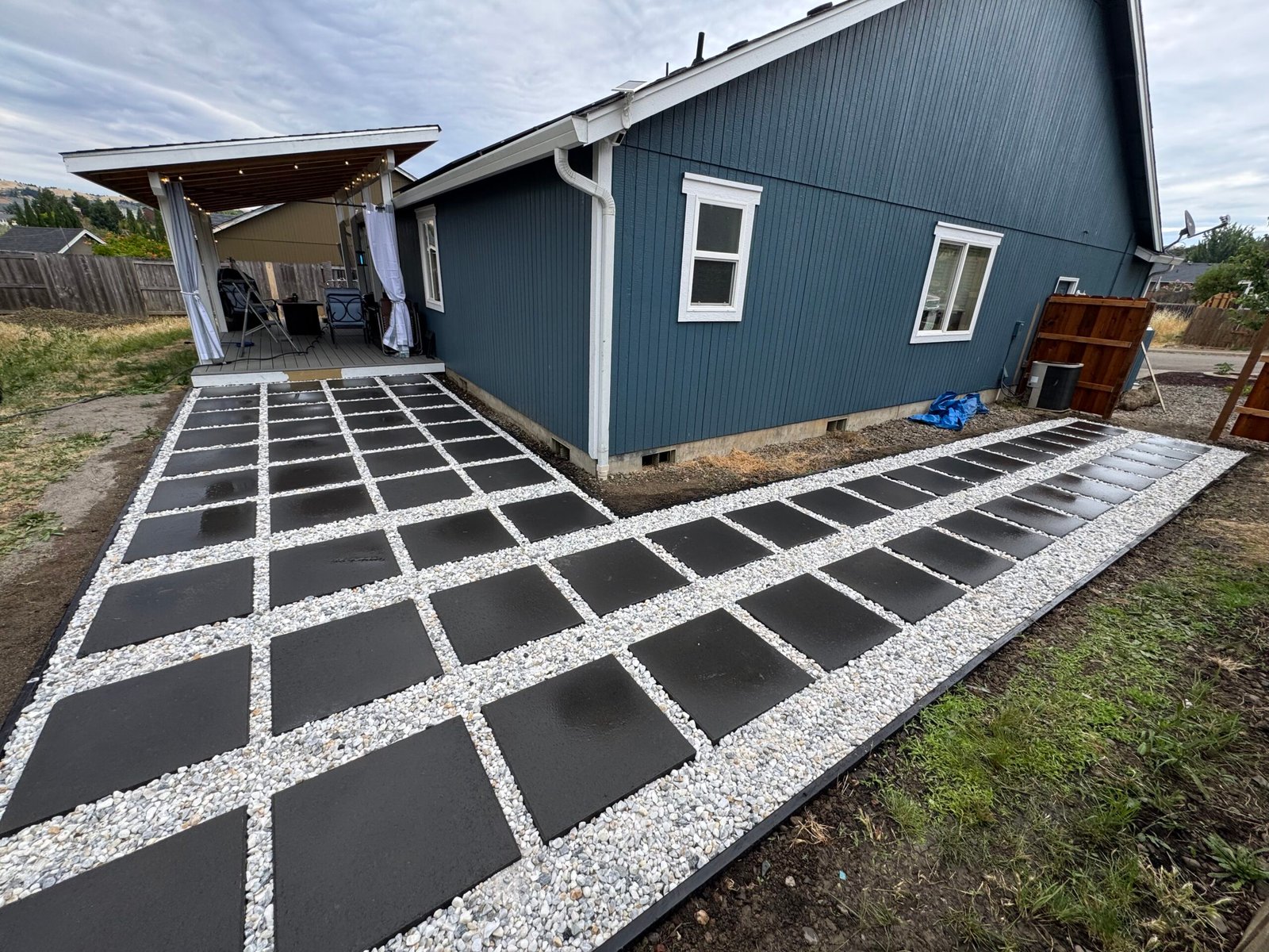 Custom paver hardscape installation by Peridot Hardscapes