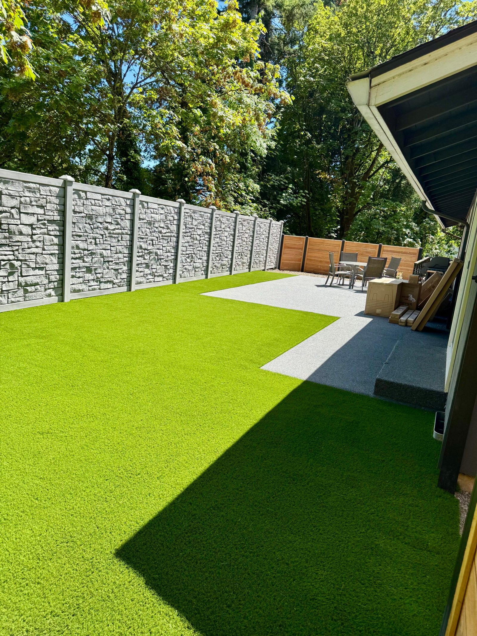 Backyard artificial turf and patio