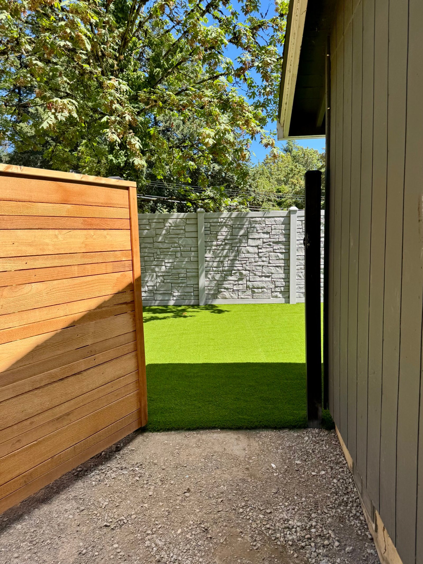 Backyard turf and hardscape installation by Peridot Hardscapes, Lake Oswego OR